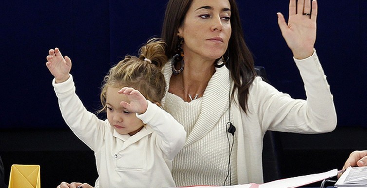 Licia Ronzulli takes part with her daughter Victoria in a voting session at the European Parliament in Strasbourg-1394464