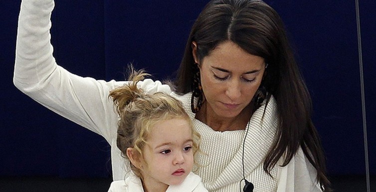 Licia Ronzulli takes part with her daughter Victoria in a voting session at the European Parliament in Strasbourg-1394465