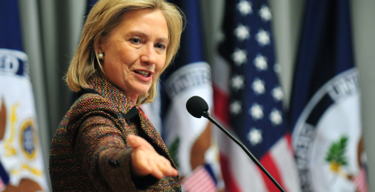 Secretary of State Hillary Clinton delivers remarks at the launch of the 100 Women Initiative in Washington